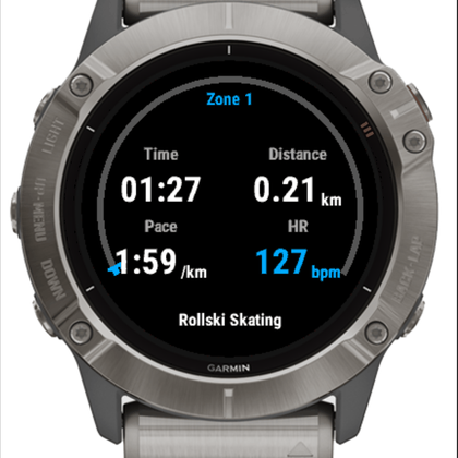 Nordic Sports recording screen showing heart rate 127 with the heart-rate zone arc and a speedometer-style needle